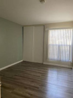 Renovated studio apartment with new kitchen and ample natural light in a historic building