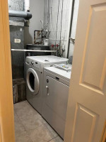 NEWLY RENOVATED THREE LEVEL TOWNHOUSE WITH 4 BEDROOMS & 2.5 BATH