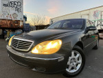 2002 Mercedes-Benz S430 luxury car with low mileage, featuring a smooth ride and elegant design.
