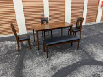 Table with 3 chairs and one bench