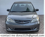 Front view of a 2004 Honda Civic LX, excellent condition, with 149,000 miles for sale.