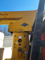 Close-up of Versalift boom on a 1989 F700 truck, showcasing its maintenance and operational features.