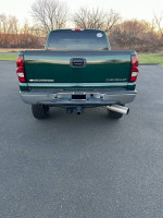 Rear view of a well-maintained Chevrolet Silverado with low rust and clean condition for sale.