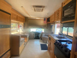 2005 Dutchman 24’ with 12’ slide 43k Miles and 1984 23’ Wellcraft