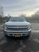 Front view of 2012 Chevrolet Silverado 1500 4x4 with 105k miles, gray color, very little rust.