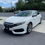 2017 Honda Civic Sport in white, showcasing clean design and good condition, ideal for fuel efficiency.