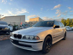 2002 BMW 5 Series 525i Wagon in silver with 112,669 miles, featuring alloy wheels and sunroof.