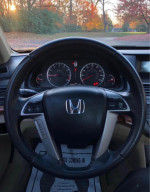 Interior view of 2008 Honda Accord EX-L showing dashboard and steering wheel with 250000 miles for sale at $1800.