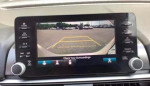 Rearview camera display showing parking area for a 2019 Honda Accord Sport.