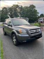 2007 Honda Pilot EX-L 4WD parked, gray color, navigation and backup camera features, good condition