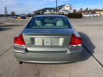2006 Volvo S60 in silver, showcasing a clean exterior and a well-maintained rear view, ideal for car enthusiasts.