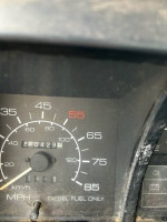 Speedometer of a 1993 Chevy Tiltmaster Van showing 240,423 miles