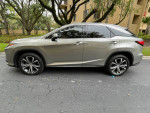 2017 Lexus RX 350 AWD with low mileage parked in a residential area