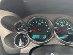 Dashboard of a 2009 Chevrolet Silverado showing odometer reading of 126,519 miles and essential gauges.