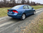 2008 Honda Civic LX FWD parked on a gravel road with grass in background, great condition, 102,000 miles.