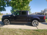 2007 Ford F-150 Harley-Davidson in Dark Amethyst, showcasing its sleek design and low mileage of 122,000 miles.