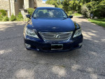 Front view of a well-maintained 2010 Lexus LS460 AWD in blue color, perfect for family travel.