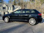 2009 Audi A3 Quattro hatchback in black, showcasing its sleek design and low mileage of 82,000 miles.
