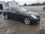 2005 INFINITI G35 RWD exterior view, family-friendly car with highway mileage, clean undercarriage.