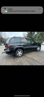 2005 Chevrolet Trailblazer LT for sale, black SUV with leather seats and sunroof.