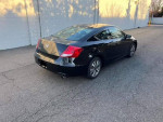 2008 Honda Accord LX coupe in black parked on a street with clean lines and well-maintained exterior