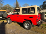 1993 Toyota Landcruiser BJ FJ 73 4X4 with turbo diesel motor parked in Sacramento, showing no rust and a clean design.