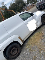 2010 Chevrolet HHR LS FWD parked, showing worn exterior and delivery modifications for sale as-is.