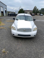 Front view of a 2010 Chevrolet HHR LS FWD, gas-saver car with 133,000 miles for sale as-is.