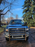 2008 Ford F350 King Ranch Super Duty truck with 151K miles, featuring a 6.4 PowerStroke engine and new tires.