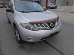 2012 Nissan Murano in silver, showcasing all-wheel drive and clean title, running great with 167k miles.
