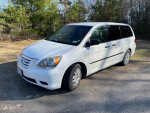 2010 Honda Odyssey EX white minivan with low mileage and new tires parked outdoors