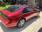 1990 Nissan 300ZX in excellent condition with leather interior, parked outside in a residential area.