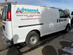 1999 Chevrolet Express van with shelving, running well, ready for work, minor cosmetic imperfections.