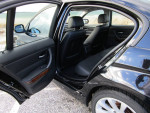 Interior view of a 2011 BMW 328i X Drive with black leather seats and excellent condition