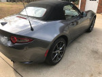 2019 Mazda Miata GT-S in excellent condition with only 3,150 miles, featuring a convertible top and sleek design.