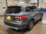 2019 Honda Pilot Touring FWD in blueish-grey color with black leather interior, great condition, remote start, new battery.