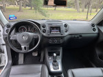 Interior view of a 2016 Volkswagen Tiguan SE with leather seats and modern dashboard features