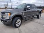 2017 Ford F250 Platinum truck with clean Texas title and 98k miles, showcasing a sleek design and good condition.