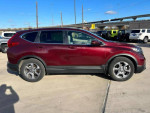 2019 Honda CR-V EX FWD in Basque Red Pearl II with 141,000 miles, side view showcasing its design and wheels.