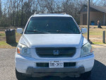 2005 Honda Pilot in white, showcasing 3rd row seating and clean exterior details, well-maintained with 106,000 miles.
