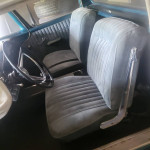 Interior view of a classic 1958 Ford Edsel Ranchero with custom bucket seats and vintage design.