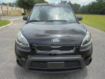 Front view of a clean 2013 Kia Soul sport SUV, showcasing its stylish design and features.