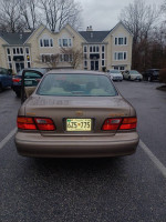 1998 Toyota Avalon XLS parked in a lot, showing rear view with Maryland license plate.