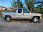 2006 GMC Sierra 1500 Ext Cab silver truck with 120,000 miles, features dual power heated leather seats