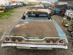Rear view of a 1963 Chevrolet Impala Convertible with minor rust, located in Modesto, California.