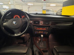 Interior view of a well-maintained 2006 BMW 330i showcasing luxury features and controls
