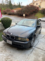 2001 BMW 530i with engine repair needed, in good body condition, parked outside.
