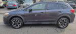 2013 Subaru XV Crosstrek in gray color with sporty wheels parked on the street