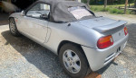 1991 Honda Beat Convertible in silver, currently not running, with parts included for repair.