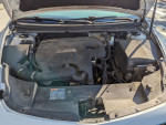 Engine compartment of a 2012 Chevrolet Malibu LS with low mileage and recent maintenance